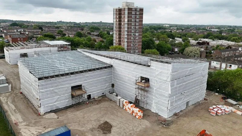 The Greenwell Academy Harlow aerial view of two sheeted temporary roofs over the new school